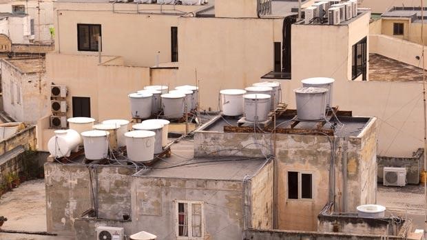 Water tanks on roofs tops are a major contributor to meter under-registration